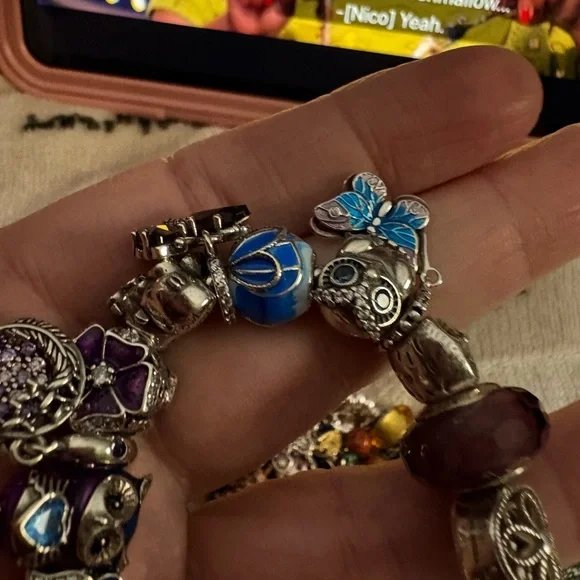 Linx bracelet with owl and butterfly charms